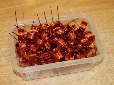 Type L4 tank inductors for SPA5 amplifiers ready for processing and assembly.  These inductors will have their leads trimmed to the proper length and the insulation on the end of the leads will be  removed. The bare wires will then be coated with lead-free solder, after which the finished inductors will be ready for assembly into the amplifier.